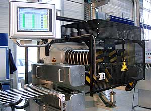 Reckwerk mit Tape Control System in einer Reimotec-Verpackungsbandanlage.