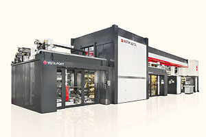 Im Vordergrund der Vistaflex CL 10 der Vista-Port; mit dem Roboter-Handlingsystem wird das Rüsten der Druckmaschine deutlich vereinfacht und um Fehlerquellen reduziert.