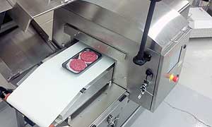 The Thermo Scientific EZx 465 Touchless X-ray machine is ideal for unwrapped products, such as meat, which cannot be passed through shielding curtains due to hygienic concerns.