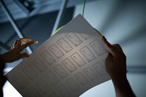 An ISBC® RFID product being created. The antennas are clearly visible in the sandwich paper sheet.